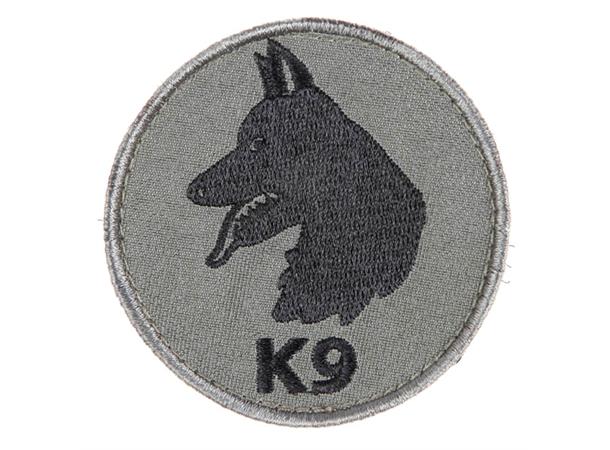 Snigel, merke for hundefører/K9